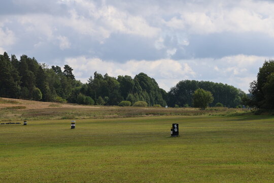 Green grass on a golf driving range with distance markers. In S&ouml;dert&auml;lje Sweden.