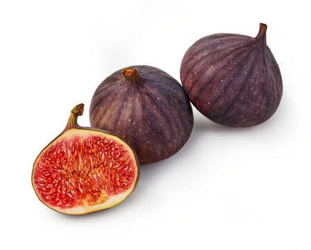 Whole and sliced figs arranged on white background