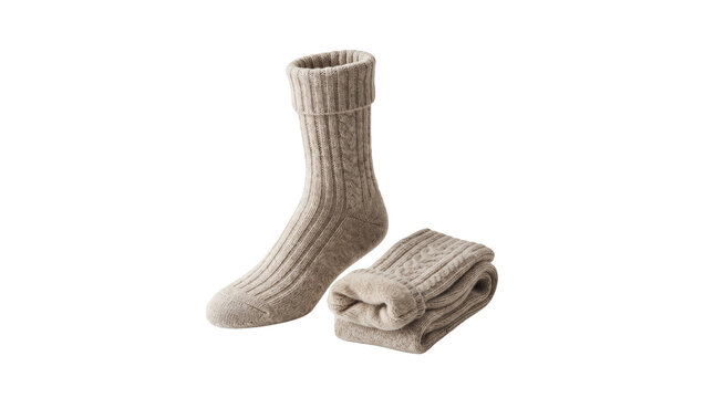 Beige wool socks with ribbed texture on white background, cozy knitted winter hosiery, warm thermal thick cotton socks for cold weather