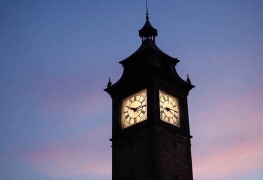 Silhouette of a Clock Tower Against a Beautiful Dusk Sky