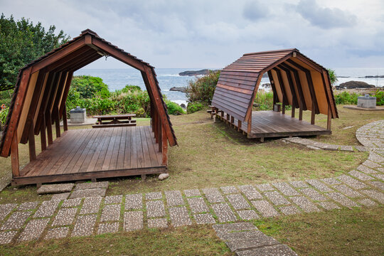 Coastal campsite with covered wooden platforms