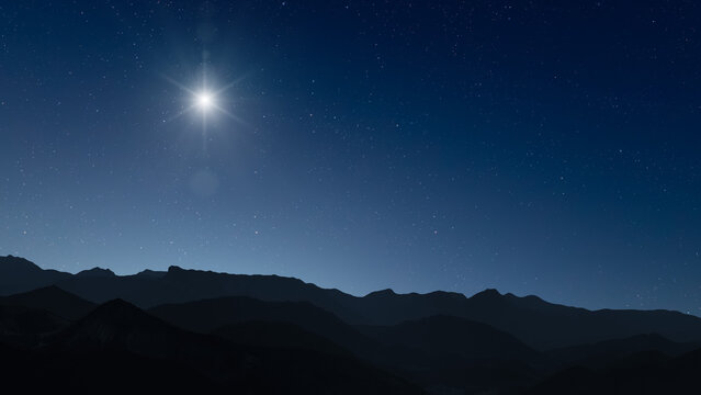 Glowing Christmas star above a peaceful mountain landscape
