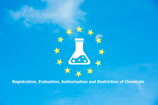 REACH text and icon on blue sky background.Registration, Evaluation, Authorization, and Restriction of Chemicals