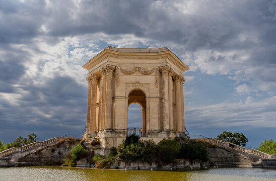Water Tower Pavilion at Promenade du Peyrou in Montpellier under Dramatic Sky