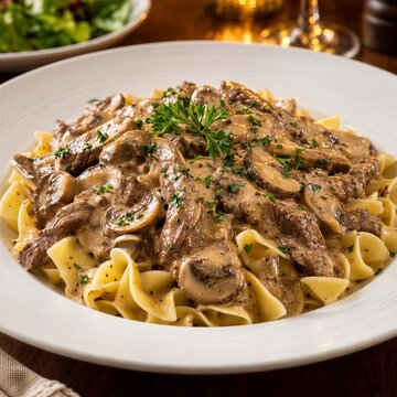 Creamy beef stroganoff with mushrooms over noodles
