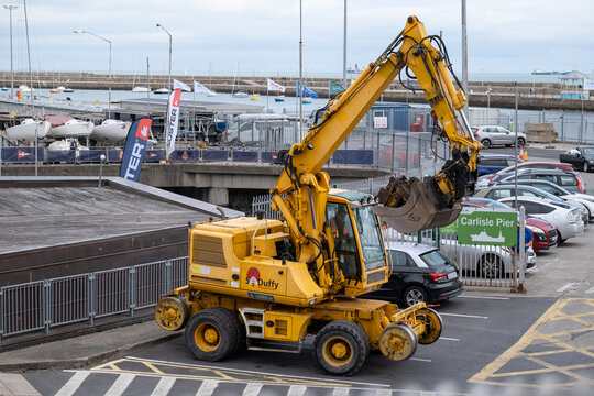 Excavator at Historic Carlisle Pier in Dun Laoghaire