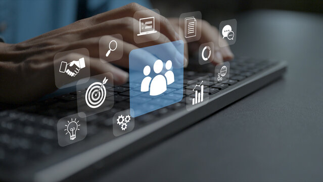 HR management concept. Person typing keyboard with employee profile, org chart and performance gear icons, digital human resources strategy and workforce administration.
