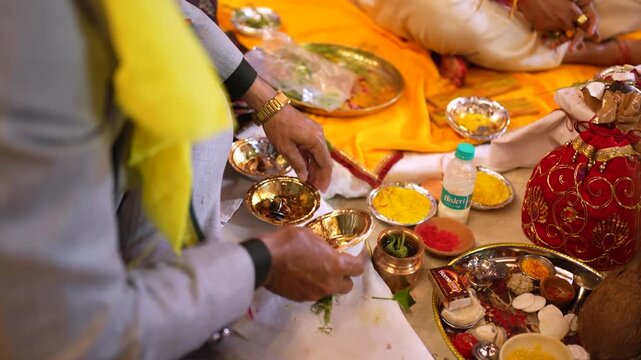 Person performing traditional Indian wedding ritual in Ghaziabad Uttar Pradesh