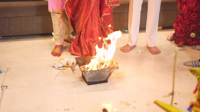 Indian bride and groom performing sacred fire ritual at a wedding in Ghaziabad