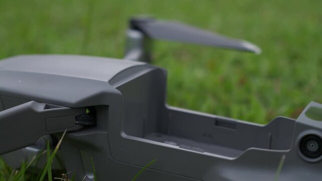Detailed close up of drone battery removal