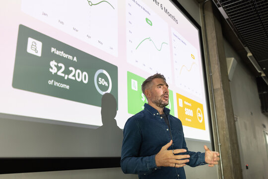 Businessman giving a presentation at a conference 