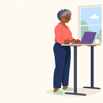 Older woman working at a standing desk in her home office