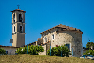Obraz premium Caslano- Switzerland- 12 May 2026: Church on hill with clear blue sky