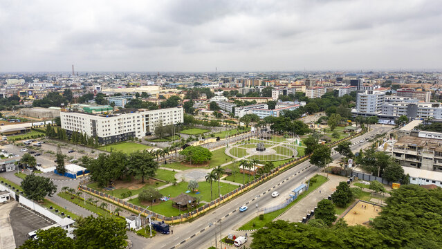 Aerial view of Johnson Jakande Tinubu JJT Park featuring lush green lawns, pathways, and surrounding urban buildings in Ikeja, Lagos, Nigeria.