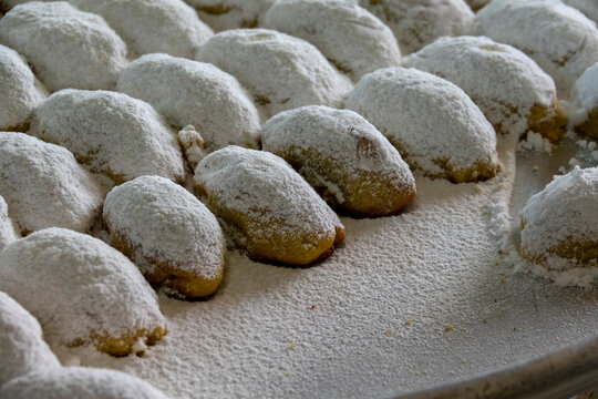 Rows of soft cookies dusted with powdered sugar cool on a baking tray, South Governorate, Tyre, Lebanon