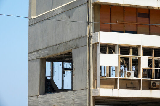 Broken windows and crumbling concrete facades mark the Electricite du Liban headquarters building damaged by the 2020 Beirut port explosion, Beirut Governorate, Beirut, Lebanon