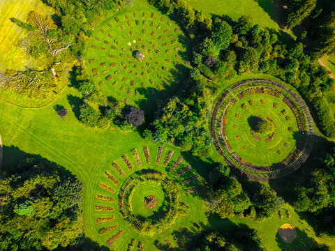 Aerial view of the circular rose gardens and manicured lawns at Sir Thomas and Lady Dixon Park in Belfast, Northern Ireland, United Kingdom.