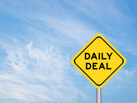 Yellow transportation sign with word daily deal on blue color sky background
