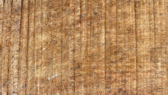 Rough sawn medium brown wood surface texture