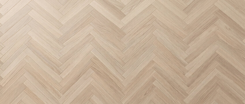 Herringbone oak wood floor texture with light natural grain and geometric zigzag pattern forming a stylish background for interior design