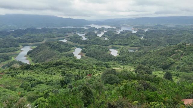 Aerial view of Ta Dung Lake and green hills in Dak Nong, central Vietnam.