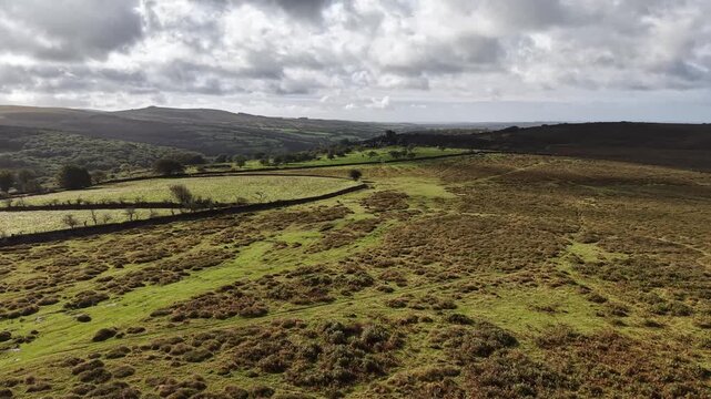 Dramatic Dartmoor landscape with Vixen tor on the horizon