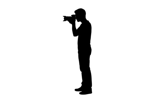Silhouette of a person holding a camera in profile view.