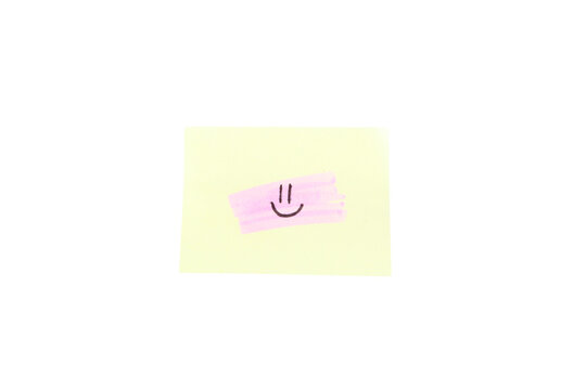 happy smiley face emoticon over a pink highlighter stroke on a square yellow sticky note paper, isolated on transparent background