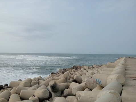 Coastal view with a breakwater