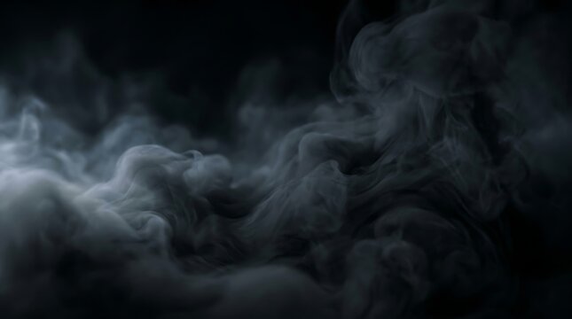 Swirling gray smoke against black background