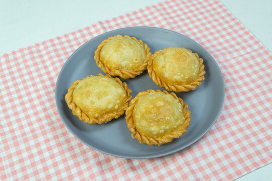 Delicious homemade Indonesian street food pastel Ufo isi bihun served on a grey plate