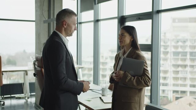Business deal. Businesspeople handshaking after successful deal. Successful agreement in business deal. Business partner dealing in office. Partnership success. Handshaking. Business partnership
