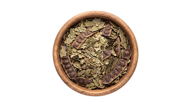 Dried senna leaves and pods in wooden bowl, organic herbal medicine for digestive health, natural laxative tea ingredients, top view of senna alexandrina isolated PNG with Transparent Background