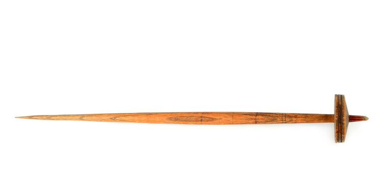 A handcrafted old wooden drop spindle is presented horizontally on an isolated white background. Featuring ample negative space, it serves as a ideal visual for historic craft projects.