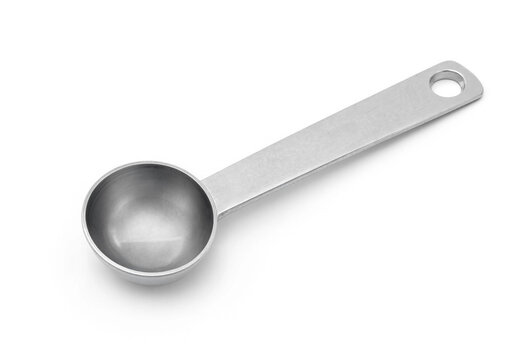 Single stainless steel measuring spoon isolated on white background with kitchen tool