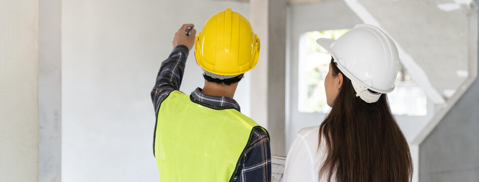 Client and Contractor discussing plan to renovation house