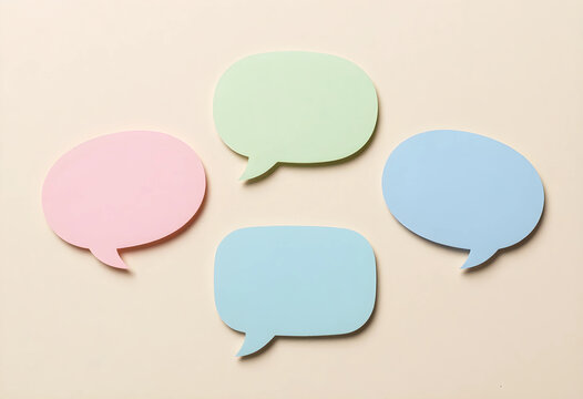 Communication and feedback concept, colorful speech bubbles for social media interaction and messaging dialogue on a neutral background