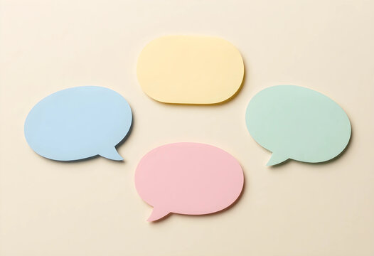 Communication and feedback concept, colorful blank speech bubbles for messaging and social media interaction on a neutral background