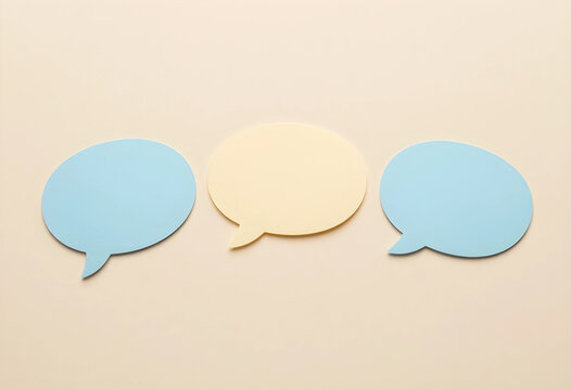 Communication and feedback concept, blank speech bubbles for social media messaging and customer service dialogue on a neutral beige background