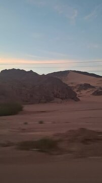 Scenic desert landscape seen through a moving car window in Egypt