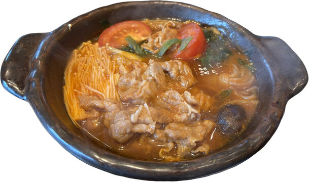 Isolated clay pot nabe with tomato broth, sliced pork, enoki mushrooms, shiitake, konjac noodles, and green onions against a clean white background.