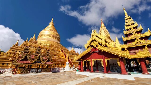 Title: Bagan, Myanmar - March 15: Novice Buddhist monks walking around the sacred Shwezigon Paya, one of Myanmar's most revered pagodas, in Nyaung U, Bagan, Myanmar (Burma).BAGAN Burmese womans visit 