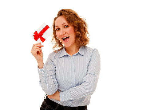 Excited woman holding gift card celebrating surprise joy