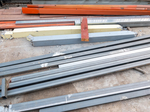 Stacked Metal Beams at Construction Site