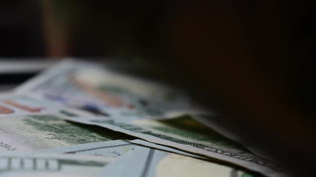 Macro close up moving shot paper texture hundred dollar bills background, money, finances, stock market background, b roll video