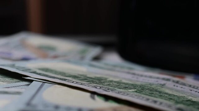 Macro close up moving shot paper texture hundred dollar bills background, money, finances, stock market background, b roll video