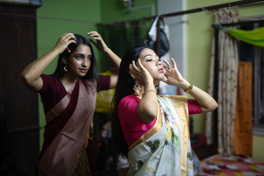 Indian woman wearing sari dress at indoors