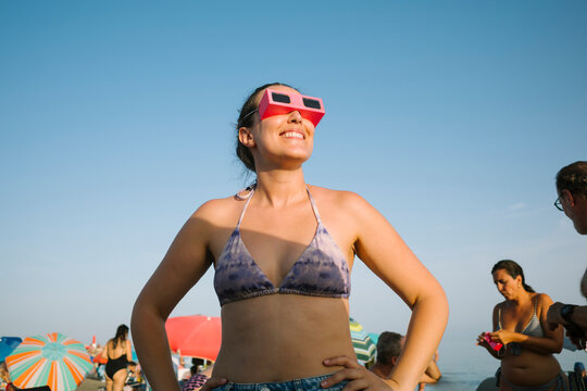 Woman Watching a Solar Eclipse