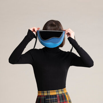 Blue Handbag Fashion Portrait With Plaid Skirt