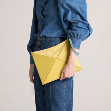 Denim Outfit With Yellow Clutch